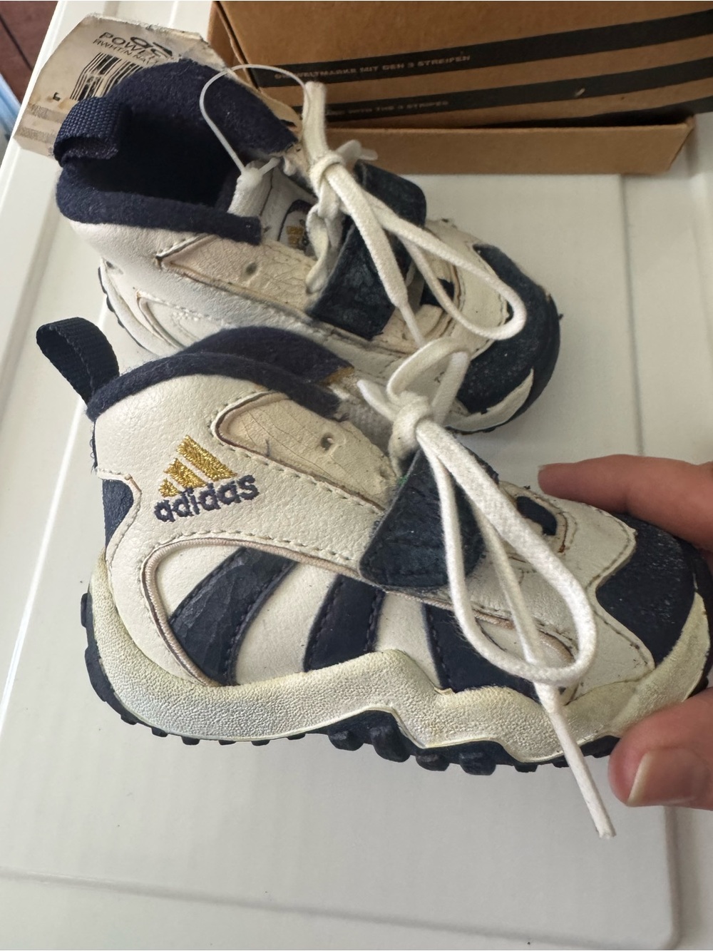 Adidas White and Navy Baby Walker Sneakers with Gold Logo